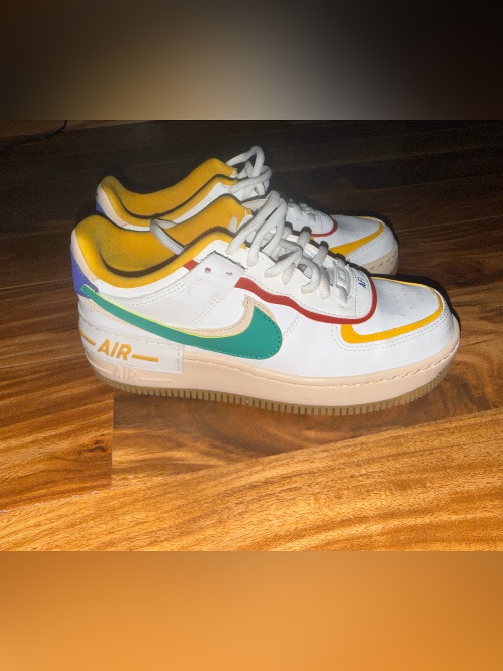 Nike White Low-Top Sneakers with green, Yellow & Red Accents